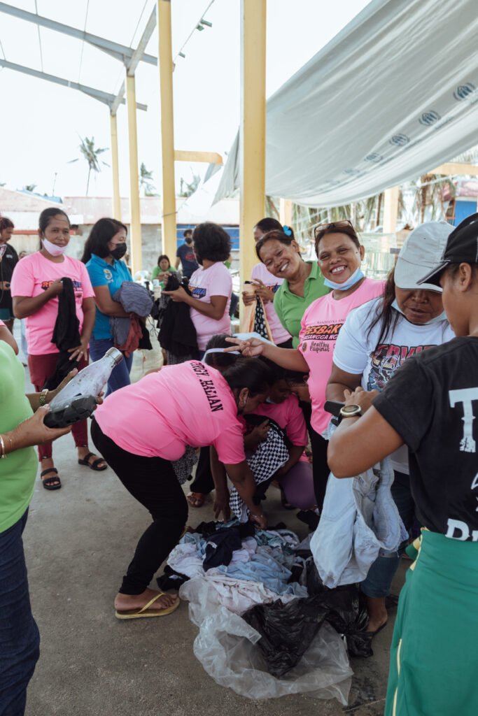 Community members sorting donated clothing during the Halian relief mission